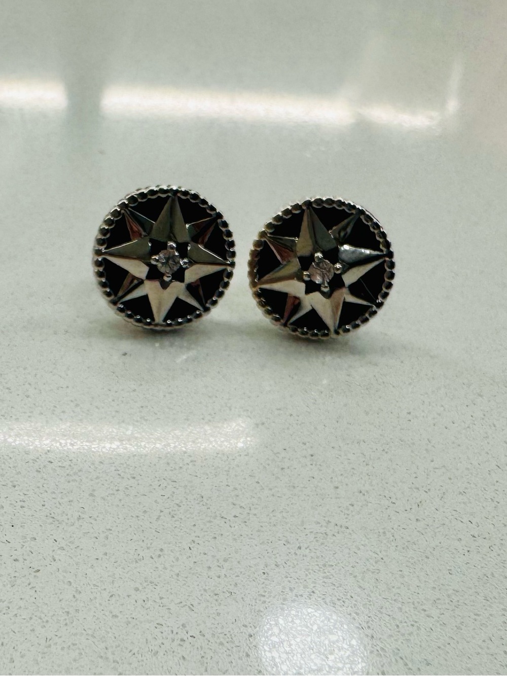 Dior Silver Star Round Earrings - Black Accent
